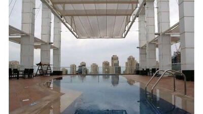 The building's large outdoor pool makes for a very scenic dip.