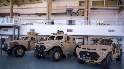 Armoured vehicles perform increasingly specialised roles. Victor Besa / The National