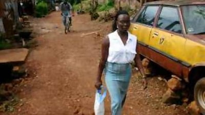 Marlon Kargbo, above, says she was abducted and forced to become a bush wife to a rebel commander.