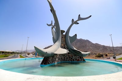 A roundabout in Dibba with sharks on it. Chris Whiteoak / The National