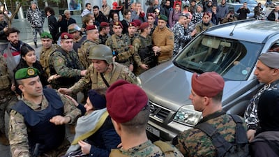 Lebanese army soldiers clash with anti-government protesters as they attempt to block a road leading to the parliament building to protest parliament meeting in downtown Beirut. EPA