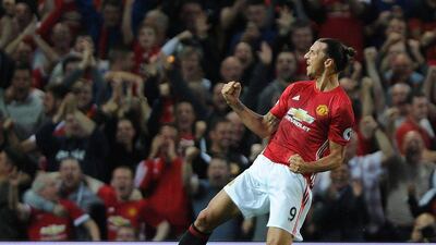 Zlatan Ibrahimovic celebrates scoring the opening goal. Peter Powell / EPA