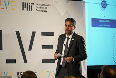 Badr Al Olama presenting at MIT. Photo courtesy of GMIS