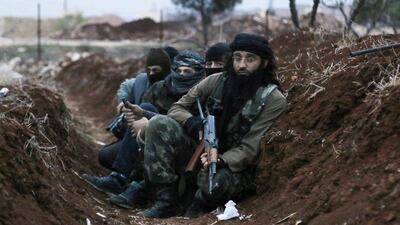 Members of al Qaeda's Jabhat Al Nusra in a trench near Al Zahra village, north of Aleppo city on November 25, 2014. Hosam Katan/Reuters