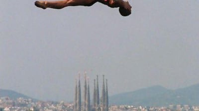 US diver Marie Ellen Clark, of Fort Lauderdale, Florida, soars over the Barcelona skyline in one of the most picture-perfect moments of any Olympics.