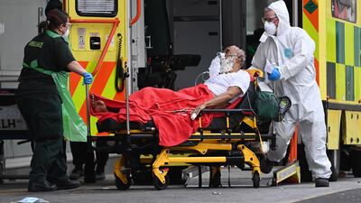 A patient is brought into the Royal London hospital in London. EPA