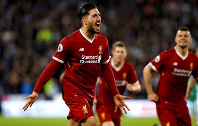 Liverpool's Emre Can celebrates scoring his side's first goal of the game against Huddersfield Town. Martin Rickett / PA