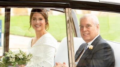 Britain's Princess Eugenie of York arrives with her father, Prince Andrew, Duke of York for her wedding ceremony. EPA