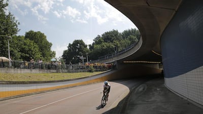 A cyclists trains on the track prior to the first stage of the Tour de France in Utrecht, Netherlands on Saturday. Christophe Ena / AP