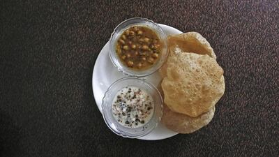 Sara Navqi’s favourite Iftar meal of puri-chole, deep fried bread and spicy chickpeas is seen in New Delhi.