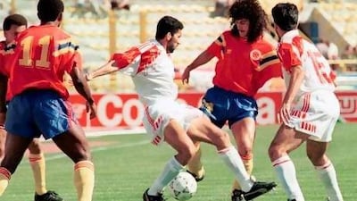 Abdulrahman Mohammed, left, challenges Colombia's Carlos Valderrama in their opening Group D game at the 1990 World Cup. The UAE lost 2-0 and were also defeated by Yugoslavia and West Germany. AFP