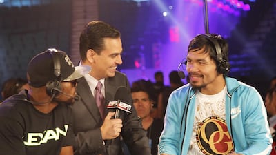 Manny Pacquiao does a television spot with Timothy Bradley before they fought last year in Las Vegas. Mike Young for The National / April 11, 2014