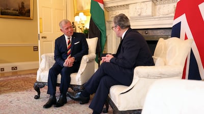 Mr Starmer said he was glad to catch up with the king on his way between visiting the US and travelling home. Bloomberg