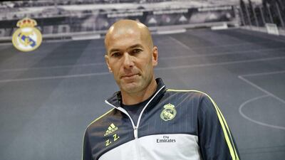 Real Madrid coach Zinedine Zidane arrives for a news conference where he explained the club's stance on the recent transfer ban. Andrea Comas / Reuters