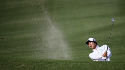 Jeung-hun Wang of Korea in action during the final round of the Dubai Open at The Els Club Dubai on December 21, 2014 in Dubai, United Arab Emirates. (Photo by Francois Nel/Getty Images)