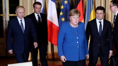 Ukrainian President Volodymyr Zelenskiy (right) pledged to resolve the crisis if he was elected. EPA