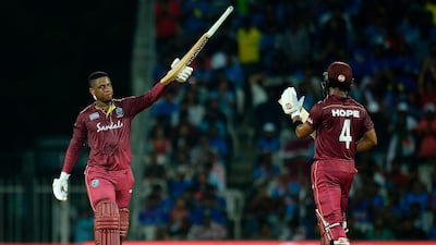West Indies' Shimron Hetmyer celebrates after scoring 100 runs during the first one day international cricket match of a three-match series between India and West Indies, at the M.A. Chidambaram Cricket Stadium in Chennai on December 15, 2019. ----IMAGE RESTRICTED TO EDITORIAL USE - STRICTLY NO COMMERCIAL USE----- / AFP / Arun SANKAR / ----IMAGE RESTRICTED TO EDITORIAL USE - STRICTLY NO COMMERCIAL USE-----
