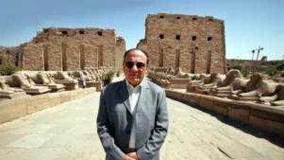 If you build it (and demolish it), they will come: Luxor's governor, Samir Farag, stands in front of the Karnak Temple.
