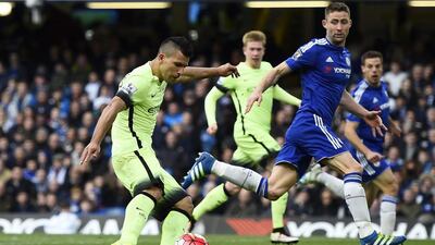 Sergio Aguero, right, scored a hat-trick and celebrated with Kevin de Bruyne, centre, a former Chelsea employee, at Stamford Bridge. Dylan Martinez / Reuters