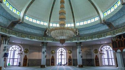 The mosque has 56 windows, carved and beautifully painted with Islamic art and motifs. Getty Images