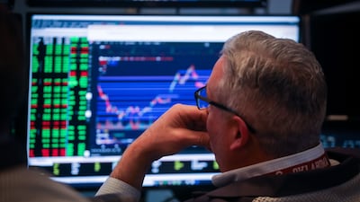 A trader works on the floor of the New York Stock Exchange. Stocks opened the new year on a positive note. Bloomberg