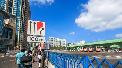Minibuses shuttled commuters from low-income areas like Mussaffah to their places of work in Downtown Abu Dhabi. Victor Besa / The National. Section: NA Reporter: