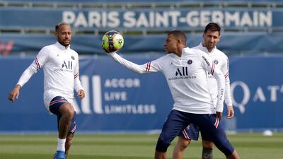 Paris Saint Germain's Kylian Mbappe (C), Lionel Messi (R) and Neymar at training session in Saint-Germain en Laye, near Paris. EPA
