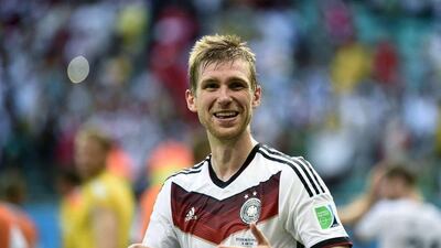 Per Mertesacker reacts during Germany's win over Portugal in their 2014 World Cup Group G opener on June 16, 2014. Odd Andersen / AFP