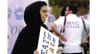 Azza al Nuaimi, a business science student at Zayed University, was one of the three student organisers of the Beat the Heat walkathon held at Safa Park in Dubai yesterday. Jeff Topping / The National