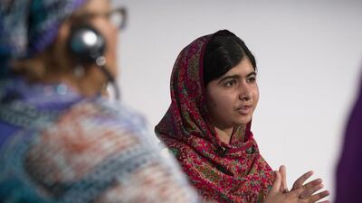 Pakistani rights activist Malala Yousafzai speaks at the Girl Summit 2014 in London, England, on July 22, 2014. Oli Scarff / AFP