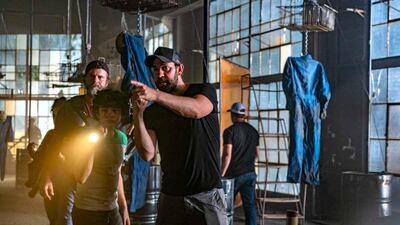 Director John Krasinski and Noah Jupe, left, on the set of 'A Quiet Place Part II'. Paramount Pictures