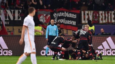 Bayer Leverkusen players celebrate after Admir Mehmedi’s late equaliser against AS Roma on Tuesday in their 4-4 Champions Leagu draw. Dennis Grombkowski / Bongarts / Getty Images