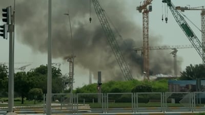 Smoke rises from the site on Yas Island. Photo: The National