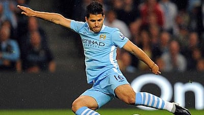 Sergio Aguero scored two goals in Man City's 4-0 win against Swansea, but manager Roberto Mancini says there is more to come from the Argentinian.