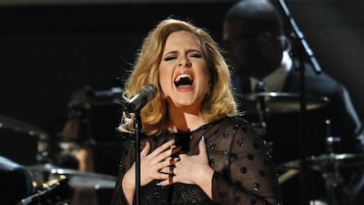 Adele performs at the 54th annual Grammy Awards in Los Angeles, California. REUTERS/Mario Anzuoni
