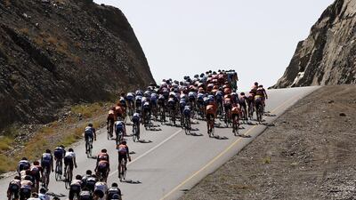 The peloton rides uphill on Friday during the fourth and final stage of the Tour of Oman. Sebastien Nogier / EPA