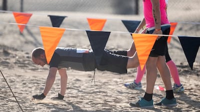 A team forms a 'wheelbarrow'.