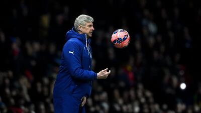 Arsenal manager Arsene Wenger shown during his side's 2-1 FA Cup quarter-final win over Manchester United on Monday night. Laurence Griffiths / Getty Images / March 9, 2015