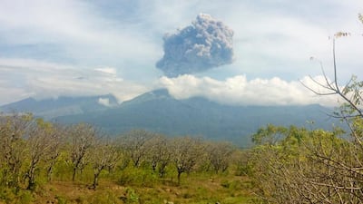 Mount Barujari, located inside Mount Rinjani volcano, is seen erupting from Bayan district, North Lombok, Indonesia on September 27, 2016. Antara Foto / Santanu Bendesa / via Reuters