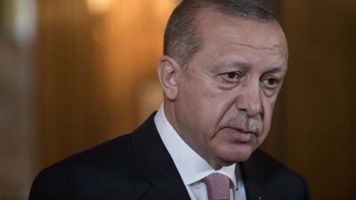 President Recep Tayyip Erdogan speaks during a joint news conference in London. Mr Erdogan on Tuesday called Israel an "apartheid state" as Ankara ordered the Israeli ambassador to leave. Simon Dawson / EPA