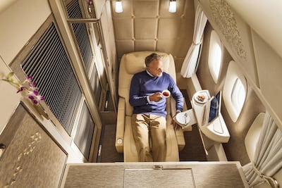 A passenger enjoys the luxury of an Emirates' first class cabin. Photo: Emirates