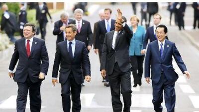 European Commission president Jose Manuel Barroso, French president Nicolas Sarkozy, US president Barack Obama and Japanese prime minister Naoto Kan walk after a lunch meeting at the G8 summit in Deauville, France. Philippe Wojazer / Pool / AP Photo