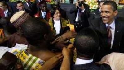 Barack Obama greets members of the Ghanaian Parliament in Accra.
