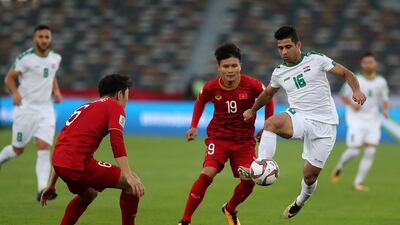 Hussein Al Saedi, No 16, of Iraq in action against Vietnam during their Asian Cup opener at Zayed Sports City Stadium in Abu Dhabi. Iraq won 3-2.