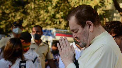 Singer Nitin Mukesh pays his respects. AFP
