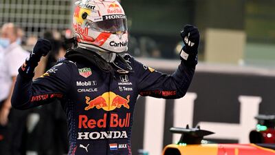 Red Bull's Max Verstappen celebrates at the Yas Marina Circuit after claiming pole position at the Abu Dhabi Grand Prix on Saturday, December 11. AFP