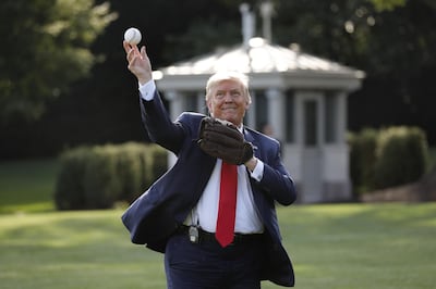 Donald Trump throws a baseball on the South Lawn of the White House in Washington, DC, US, on July 23. Yuri Gripas/ Abaca / Bloomberg