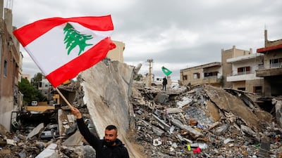 Lebanese people take stock of the damage on Wednesday after the war between Israel and Hezbollah. Reuters