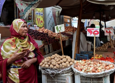 A stallholder at a market in Cairo, Egypt. Reuters