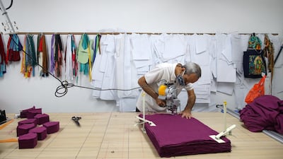 Qurbani, a 59-year-old an Afghan refugee who has been in Malaysia for four years, makes protective face masks in Kuala Lumpur, Malaysia. Refugee tailors make more than 7,000 sets of personal protection equipment (PPE) for medical frontliners in hospitals and clinics around Kuala Lumpur. World Refugee Day 2020 theme by United Nations High Commissioner for Refugees (UNHCR) is 'Every Action Counts' to celebrate refugees who are on the frontlines fighting this pandemic, their hosts and the aid workers supporting them. EPA